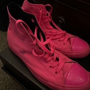 Dark pink women Converse sneakers.